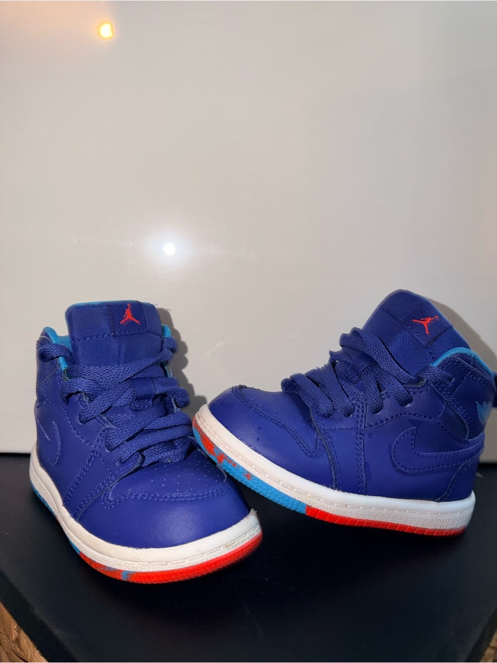 Nike toddler-sized Air Jordan 1 Retro High Top sneakers Jumpman logo.
